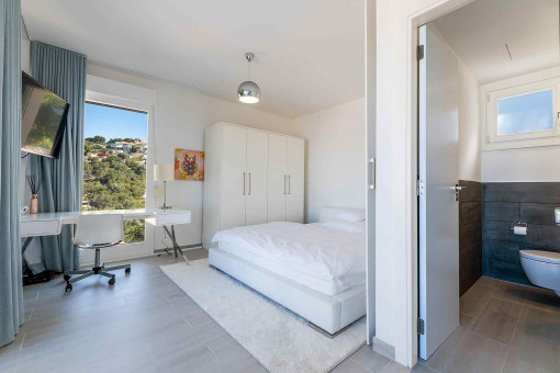 Schlafzimmer mit Badezimmer en Suite
