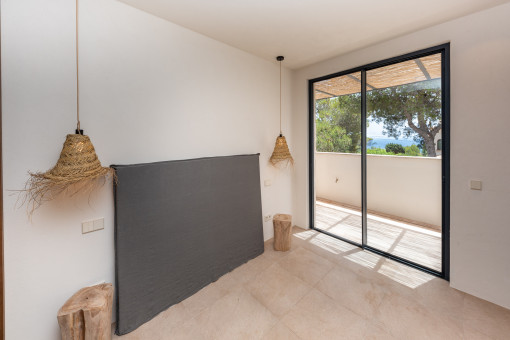 Schlafzimmer mit direktem Zugang zur Terrasse