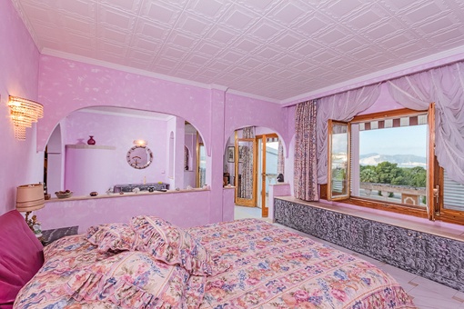 Schlafzimmer mit herrlichem Landschaftsblick