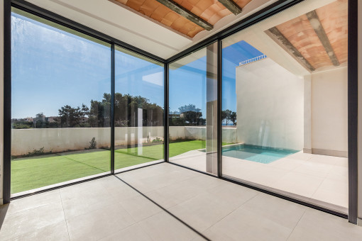 Neubau Erdgeschosswohnung mit Garten und Pool in Colonia St. Jordi
