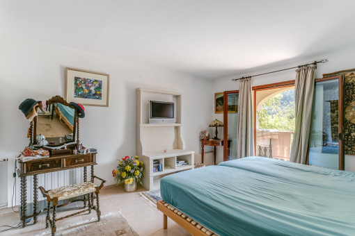 Doppelschlafzimmer mit Zugang zur Veranda