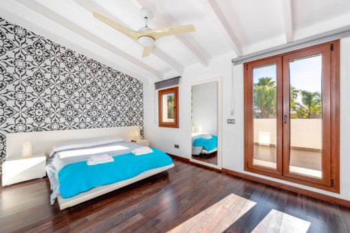 Schlafzimmer mit Badezimmer en Suite