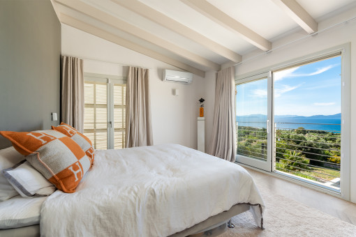 Schlafzimmer mit einmaligem Meerblick