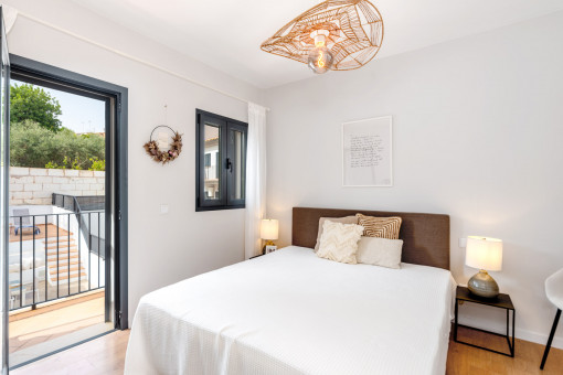 Schlafzimmer mit Balkon