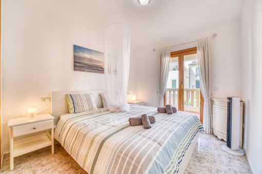 Schlafzimmer mit Balkon