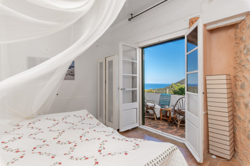 Schalfzimmer mit Balkon und Meerblick