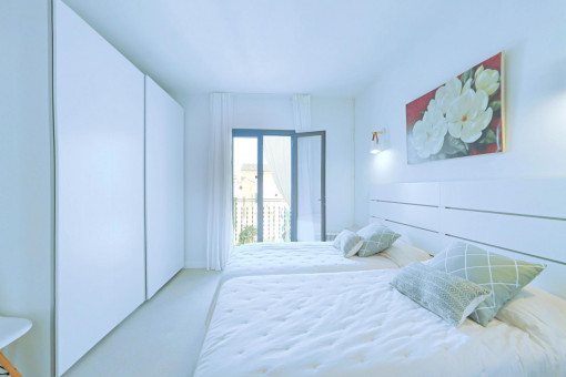 Doppelzimmer mit Zugang zum Balkon