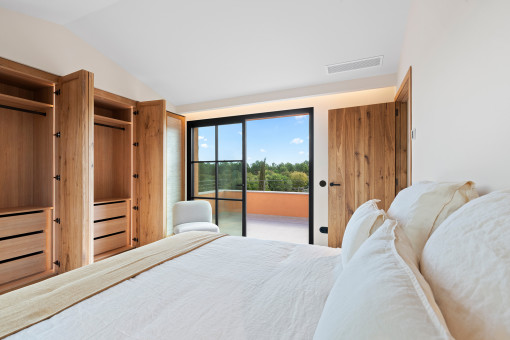 Schlafzimmer im Obergeschoss mit eigener privater Terrasse