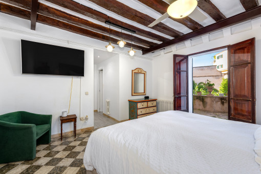 Schlafzimmer mit Badezimmer