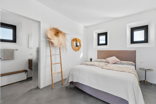 Schlafzimmer mit Badezimmer en Suite