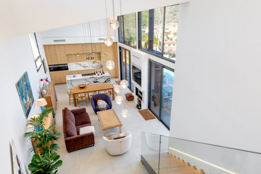 Open-plan living area with designer fireplace