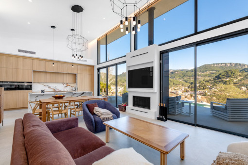 Dining area with floor-to-ceiling windows and views