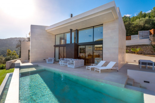 Sun-drenched infinity pool terrace in the morning light