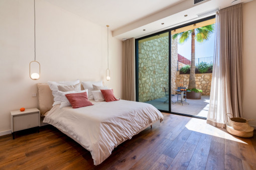 Schlafzimmer mit Patio