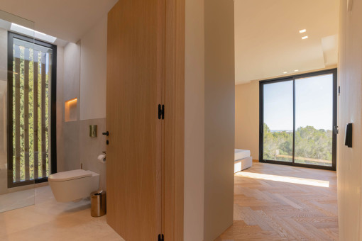 Schlafzimmer mit Badezimmer en suite 